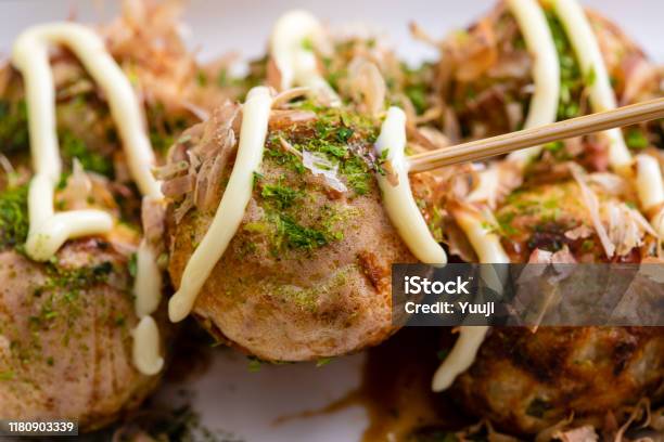 Octopus Grill Recipe Takoyaki With Mayonnaise And Green Seaweed Powder And Bonito Stock Photo - Download Image Now