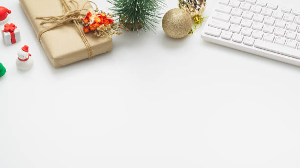 istock Merry Christmas and Happy new years office work space desktop concept. Flat lay top view with keyboard and Christmas ornaments with copy space. 1180904335
