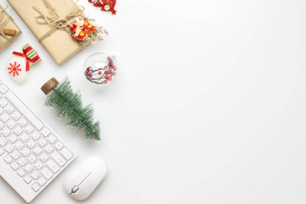 istock Merry Christmas and Happy new years office work space desktop concept. Flat lay top view with laptop, notebook and Christmas ornaments with copy space. 1180904869