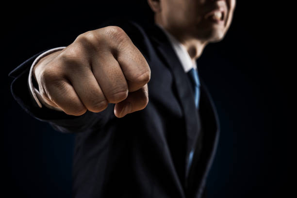 拳を突き出す実業家 - men furious boxing combative sport ストックフォトと画像