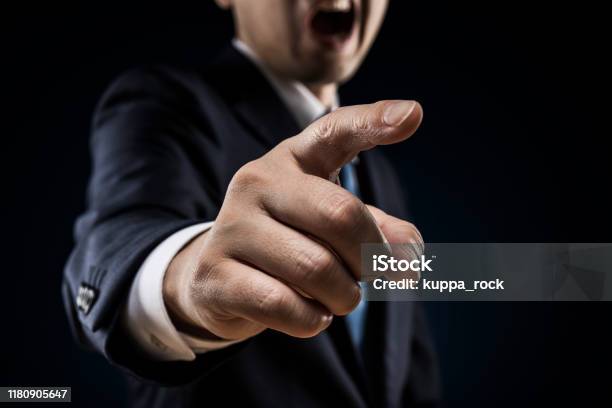 Businessman Sticks Out A Finger And Reproves It Stock Photo - Download Image Now - Anger, Manager, Rudeness