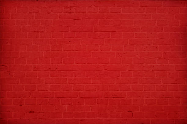 Horizontal modern bright red color brick pattern wall textured grunge background vector illustration A dark bold red colored brick wall with rectangular blocks, textured grungy backgrounds. No text. No people, copy space, copyspace.  The masonry joints joint are red in color.  Xmas, Christmas theme backgrounds brick wall stock illustrations