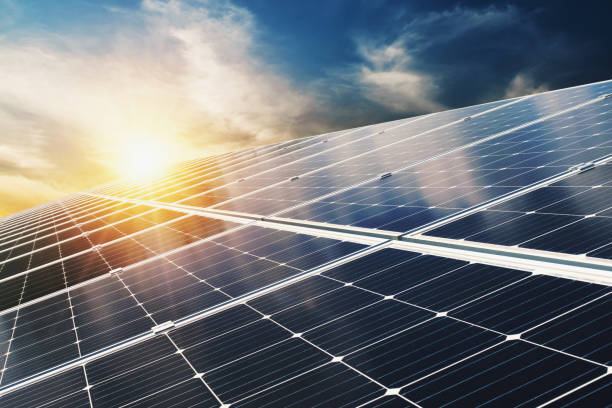 istock Solar panel with blue sky and sunset. concept clean energy, electric alternative, power in nature 1180906477