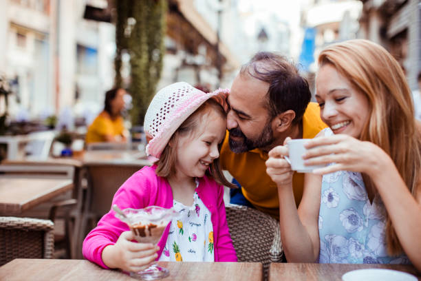 istock Family in a cafe 1180908620