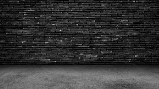 Cement floor background on studio room and spot light.Between darkness