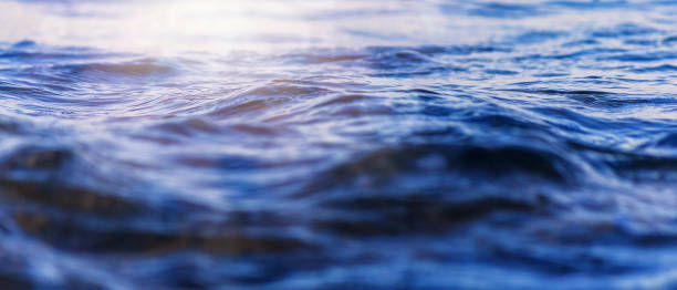 istock Sea wave close up with low angle view sunrsie shot. Background texture for text or design. 1180910478