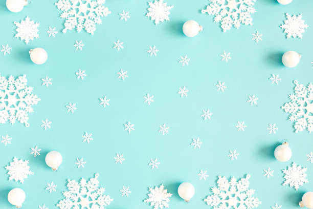 istock Christmas or winter composition. Pattern made of snowflakes on pastel blue background. Christmas, winter, new year concept. Flat lay, top view, copy space 1180911074