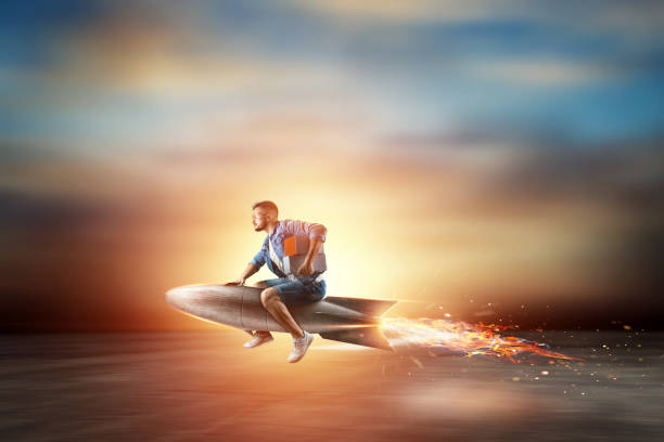 istock A man flies on a rocket, delivers parcels. Super fast delivery, cool service, online purchase. Copy space, Mixed media 1180911237