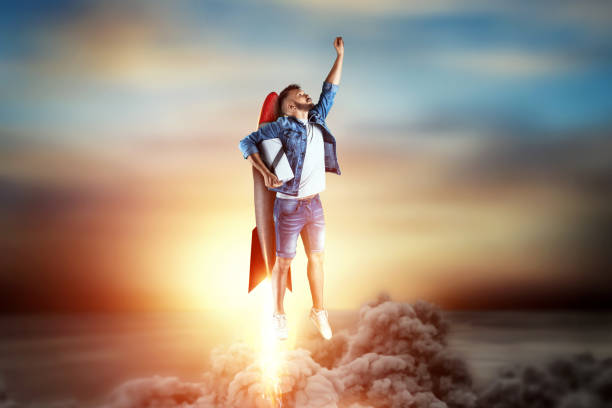 istock A man flies on a rocket, delivers parcels. Super fast delivery, cool service, online purchase. Copy space, Mixed media 1180911240
