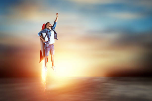 istock A man flies on a rocket, delivers parcels. Super fast delivery, cool service, online purchase. Copy space, Mixed media 1180911243