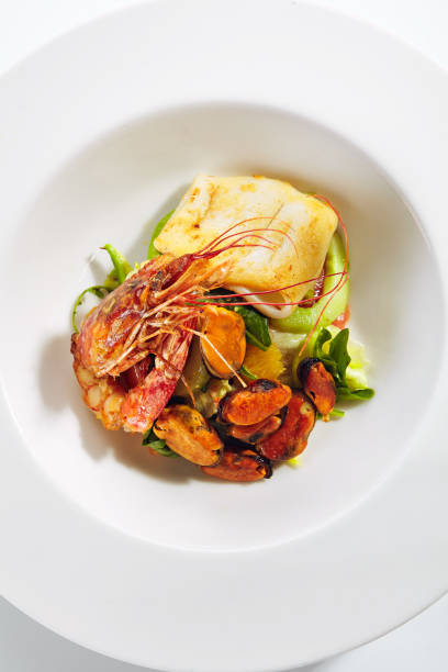istock Exquisite Serving Warm Salad with Seafood and Avocado 1180913050