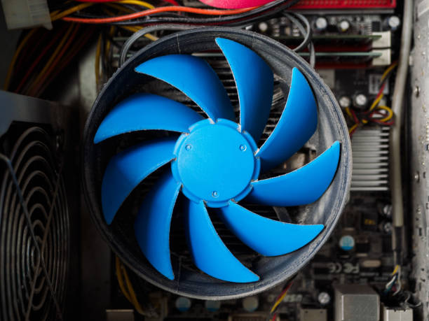 istock Blue fan and other computer boards in the dust. Dusty the insides of a computer. Complication of the PC. 1180913155