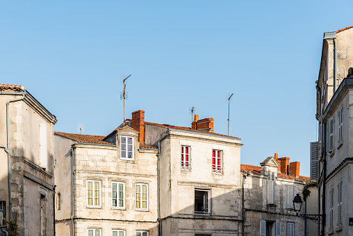 Decadent old residential buildings in the historic centre of La Rochelle, France