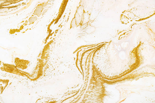 Marble golden, orange and white raster texture. Mineral stone macro surface. Color liquid flow, fluid effect wallpaper. Acrylic, oil paints mixing dynamic backdrop.
