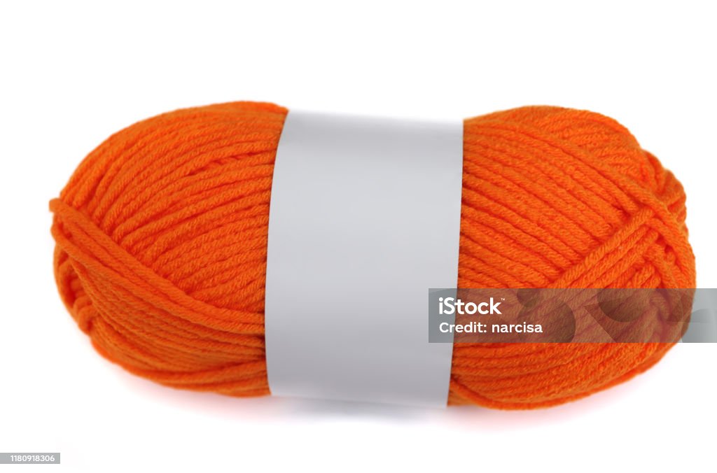 Orange yarn skein on white background Orange yarn skein on white background with blank band Ball Of Wool Stock Photo