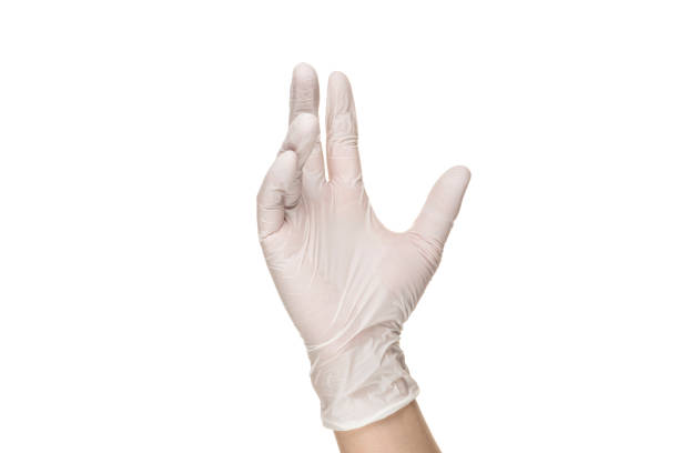 mano con guanto medico isolato bianco. - glove surgical glove human hand protective glove foto e immagini stock