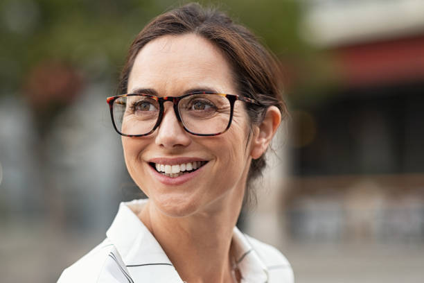 Smiling business woman with spectacles