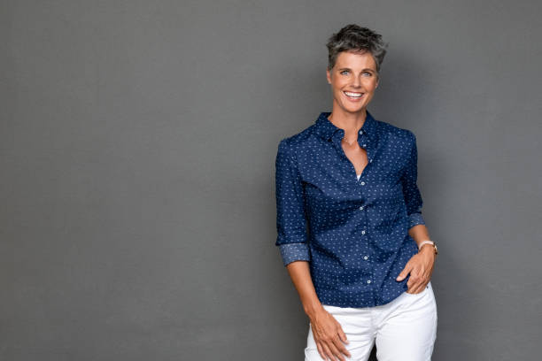 istock Successful mature woman standing 1180925239