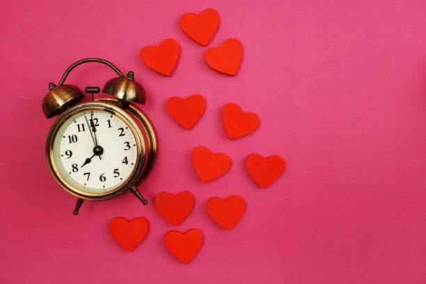 istock Vintage Alarm Clock and Pink Heart with space copy 1180925986