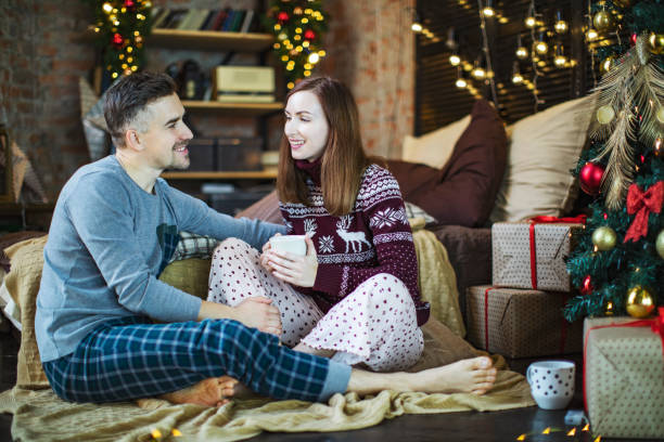 istock Couple celebrating Christmas 1180926122