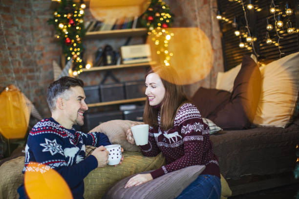 istock Couple celebrating Christmas 1180926335