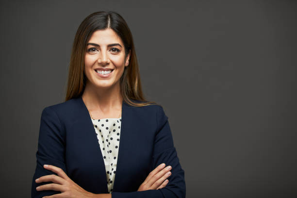 Beautiful businesswoman with arms crossed and looking at camera. Studio headshot on white background. Spanish model.
Dark chalk-gray background. mediterranean ethnicity stock pictures, royalty-free photos & images