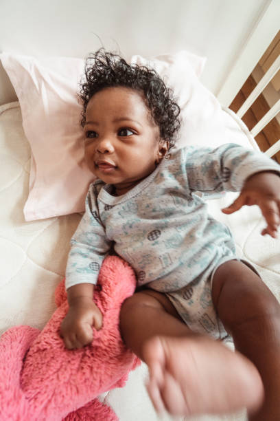 istock happiness african kid in the crib 1180927520