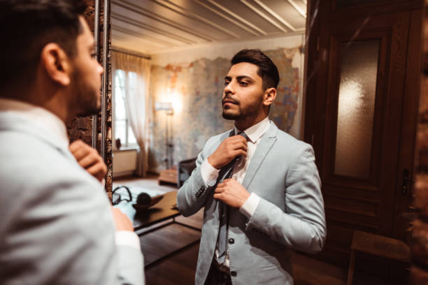 istock turkish business man in front of the mirror 1180927678