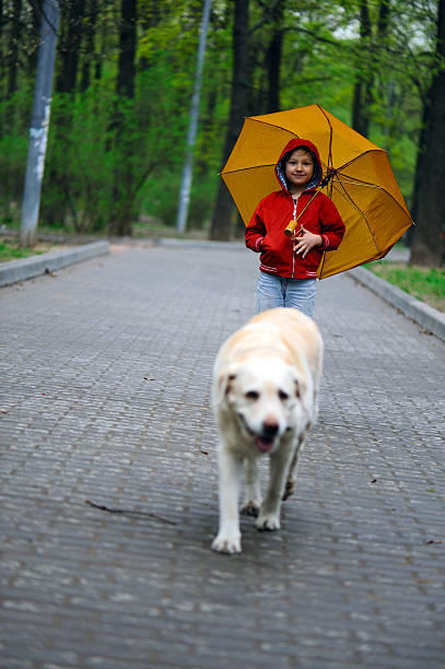 istock Little girl and a dog 118092771