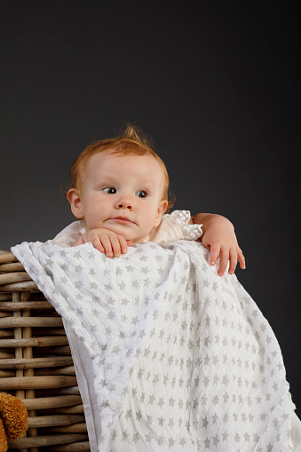 Baby Portrait cute baby girl  Playing in basket