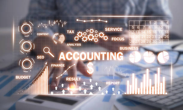 istock Financial graphs. Accountant working on desk using calculator. Accounting 1180930348