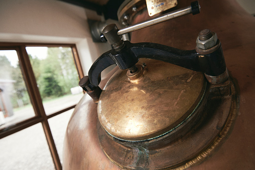 Old copper kettle at a distillery