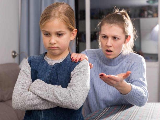 istock Woman scolding her daughter 1180936953
