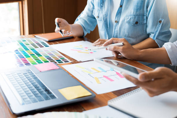 istock Cropped Image Of Design Professionals Working On Desk 1180940315
