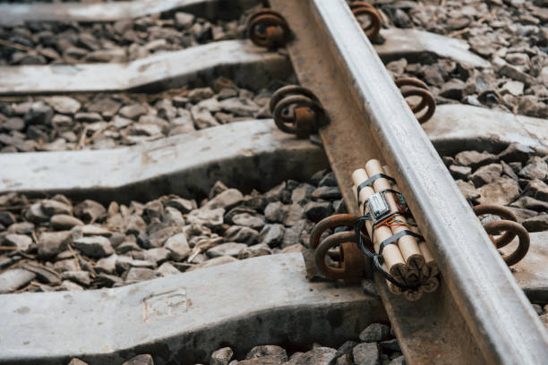 istock Rusty metal. Timebomb on the railway at daytime outdoors. Conception of terrorism and danger 1180942032
