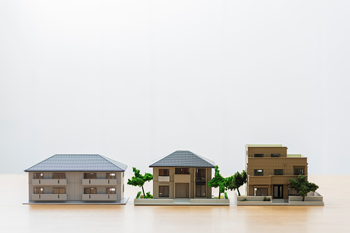Arrange architectural models on the table