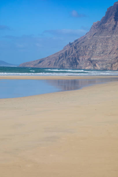 istock Famara Beach in Lanzarote sunny day 1180953306