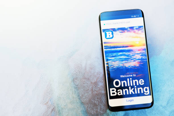 istock Mobile phone shows login page for online banking app 1180953360