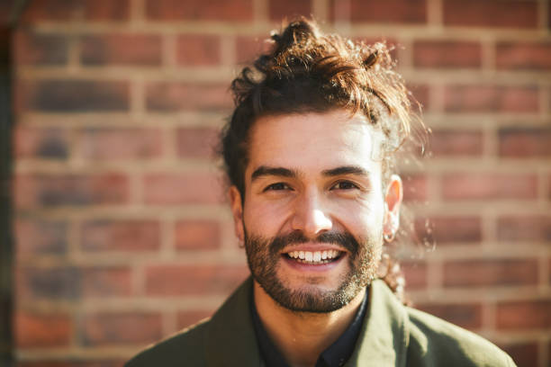 istock Headshot of a young Hispanic American man. 1180956027