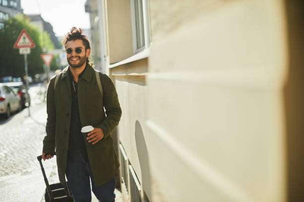 istock University student traveling arriving at Berlin. 1180956029