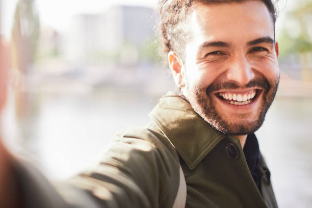 istock Young Latin American tourists taking a selfie in Berlin. 1180956042