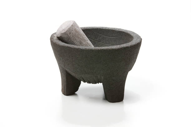 istock Lava Rock Mortar and Pestle on white background 1180956605
