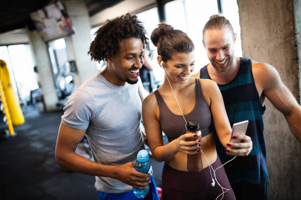 Friends making selfie in the gym after workout