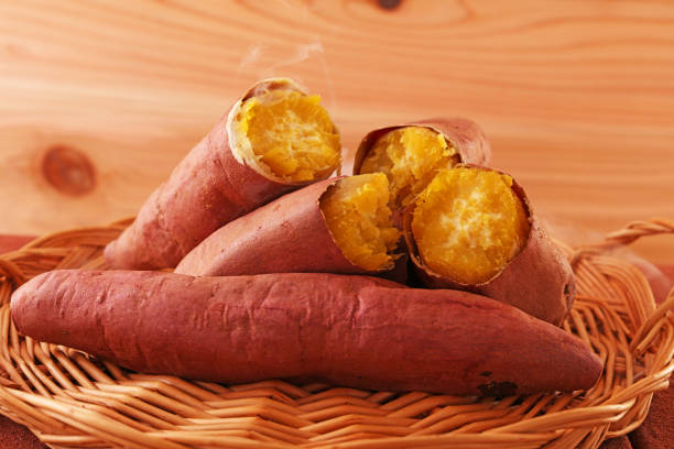 Baked sweet potatoes on a wicker tray