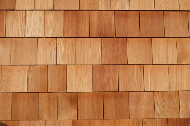 istock Facade with rectangular wooden shingles at a house in the Alps, switzerland, europe 1180958116
