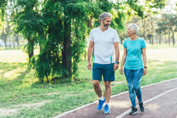 istock Senior couple relax after jogging 1180959128