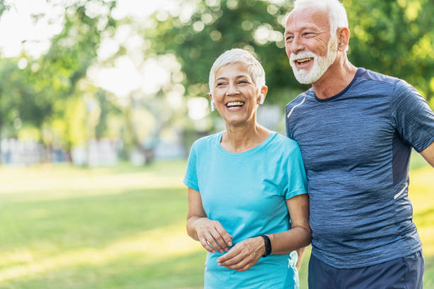 istock Senior couple relax after jogging 1180959133