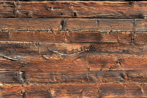 Detail of the wooden wall at an old alpine house in switzerland, europe