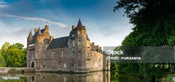 View Of The Historic Chateau Trecesson Castle In The Broceliande Forest With Reflections In The Pond Stock Photo - Download Image Now