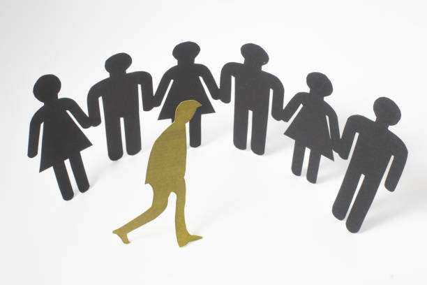 istock Group of paper people holding hands. 1180964784